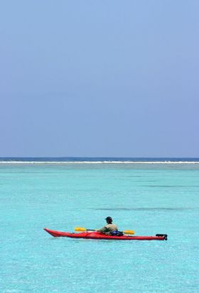 Sea kayaker at Ambergris Caye, Belize – Best Places In The World To Retire – International Living